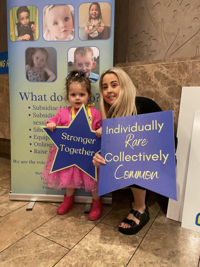 Louise-and-Molly-holding-Rare-Ireland-banners